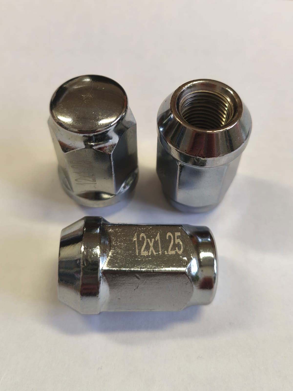 Гайка колесная М12*1,25 (35, ключ 19, конус, закрытая, хром) N0806 Гайка колесная М12*1,25 (35, ключ 19, конус, закрытая, хром) N0806